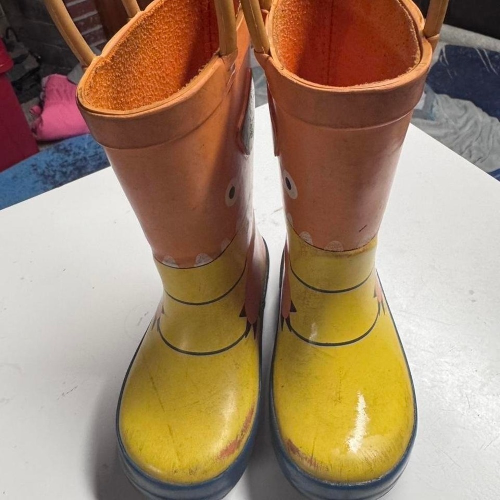 Yellow and orange rain boots